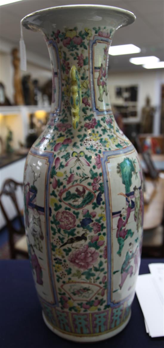 A pair of large Chinese Canton-decorated famille rose two handled baluster vases, late 19th century, height 60.5cm